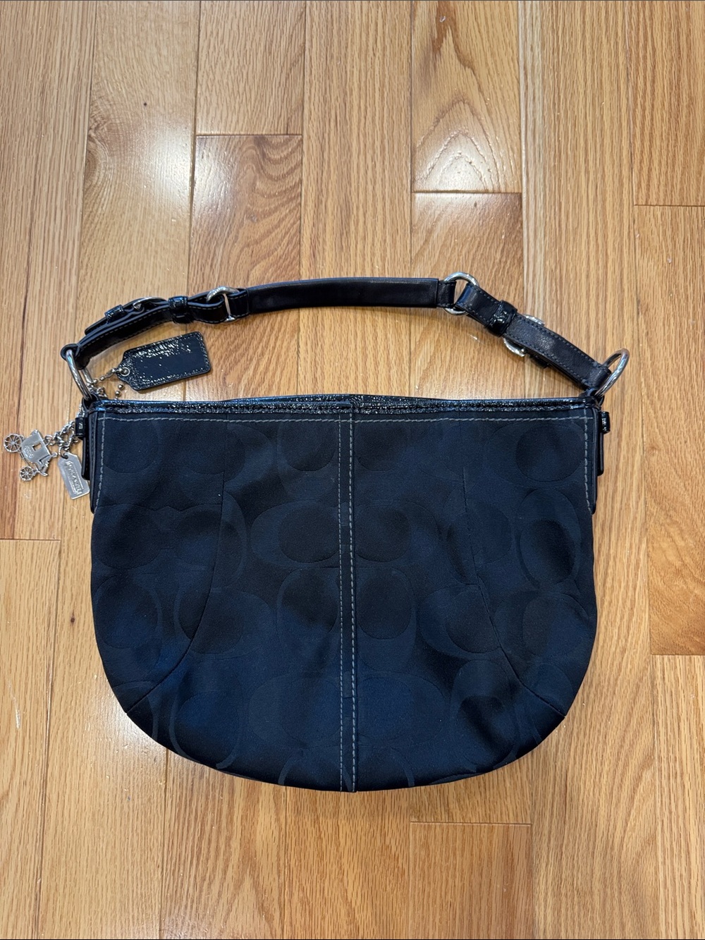 Coach hobo style shoulder bag in black Signature "C" print
